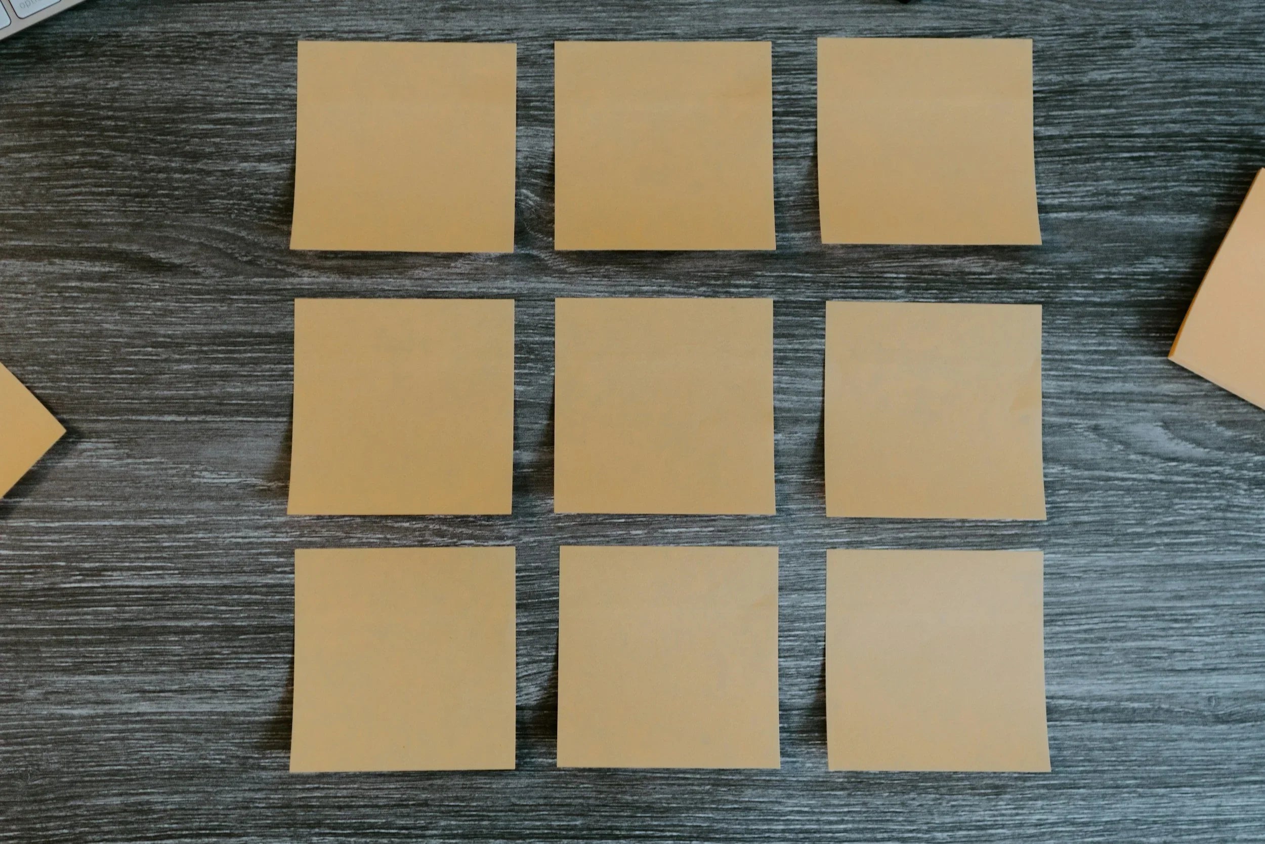 4 brown sticky notes