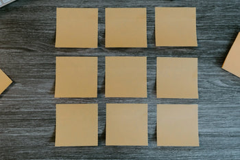 4 brown sticky notes